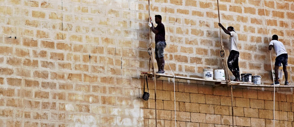 The young man, the African refugee, and the petrol station – a tale of politics and exploitation construction dangerous safety cheap labour refugees